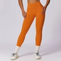 High-waist seamless compression yoga leggings in bright orange for women workout - Orange