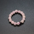 Adjustable 4mm pink natural stone beaded ring with a metallic bead on elastic cord - Rose Quartz