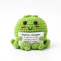 Handmade green crochet octopus holding a positive encouragement card on white background - Green Octopus P Card