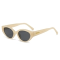 Lunettes de soleil œil de chat beige avec verres gris foncé et barre dorée - Monture Jaune Jelly Verres Gris Noir