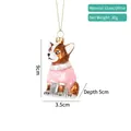 Dettaglio dell'ornamento natalizio in vetro a forma di corgi con maglione rosa - Ciondolo Corgi / Cane Rosa