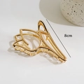 Golden 8cm alloy tulip claw clip with hollow geometric metal design for elegant hair styling - Tulip
