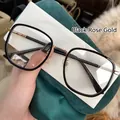 Retro oversized black and rose gold blue light blocking glasses with striped temples - Black Gold
