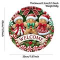 Round wooden Christmas welcome sign with gingerbread men and festive candy canes decoration - Wooden Christmas Sign Three Gingerbread Men
