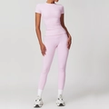 Women's pink two-piece yoga set featuring short sleeve slim top and high waist leggings - S / T-shirt + Leggings Lilac Pink