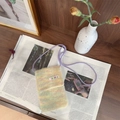 Detail of colorful knitted plush phone bag with soft mohair texture and crossbody strap - Plush Rainbow Yellow