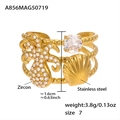 Macro detail of 18K gold plated ocean ring with zircon palm tree and seashell charms - US 7 / Gold Octopus Zirconia Style (A856)
