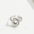 Minimalist silver open ring featuring a unique circular donut design in a polished finish - Letter O Style