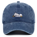 Close-up of white duck embroidery on washed denim baseball cap with premium texture - Adjustable / Navy Blue