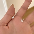 Silver rocking horse stud earrings with screw-back caps shown on fingertips - Rocking Horse Sweet Style (A293)