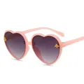 Occhiali da sole a cuore rosa per bambini con api dorate e lenti grigie sfumate - Montatura rosa lenti grigie sfumate