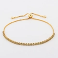 Detail eines goldenen Tennisarmbands mit gelbem Zirkonia und verstellbarem Verschluss - Grüner Zirkon 2,5 mm Armband