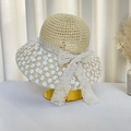 Beige woven straw sun hat with white lace flower embroidery and large lace bow tie - Beige Petal Hat