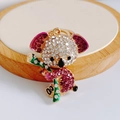 Macro detail of koala keychain featuring pink and white rhinestones and green enamel bamboo - Pendant Only / Purple