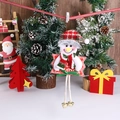 Detail von Plüsch-Schneemann-Anhänger mit Glocken und Feliz Navidad Schild für Weihnachten - Schneemann-Stil