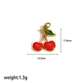 Detail view of a 17.8mm red cherry pendant with green leaves and gold metal finish - Exquisite Cherry Pendant (TP022)