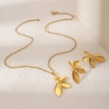Golden necklace and earrings set featuring intricate leaf design on textured background - Leaf Shape Style (E6073-30)