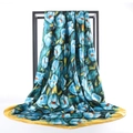 Blue morning glory print satin square scarf with yellow border hanging on a frame - Yellow and Blue