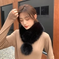 Faux fox fur neck warmer scarf in black finish featuring decorative matching pompoms - Black