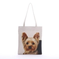 Primer plano del estampado de Yorkshire Terrier en el bolso de lona beige de estilo minimalista - Yorkshire Terrier