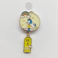 Detail of cartoon enamel pin featuring a rainbow unicorn and a lucky charm tag - Cartoon Unicorn with Tag (156)