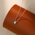 Minimalist S925 sterling silver necklace with a polished bean pendant on a fine box chain - 925 Silver / White Gold