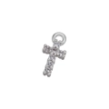 Detailed close-up of a silver cross pendant inlaid with brilliant round-cut cubic zirconia - White Gold Zirconia Cross