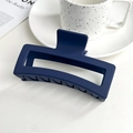Matte navy blue 13cm large rectangle shark hair clip in a modern lifestyle setting - 13cm Extra Large Square Claw-Navy Blue