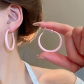 Close-up of pink round hoop earrings on ear and hand showing smooth matte finish - Pink Matte Large Hoop Earrings (56# Medium 4cm)