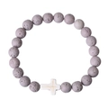 Close-up of natural grey volcanic stone beads and a white cross bead on an elastic bracelet - Gray Lava Stone Color