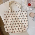 Detail of floral canvas tote bag with small red flowers and cream lattice pattern - Rhombus Small Rose