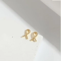 Orecchini a perno con fiocco dorato e pietre in zirconia cubica per donne - Fiocco (Oro)