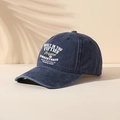 Vintage washed navy blue baseball cap with retro white embroidery on plain background - One Size / Navy Blue