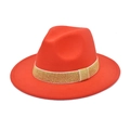 Detailed close-up of a red wool fedora hat with a decorative gold glitter band - Orange Red