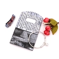 Silver bead bracelet with round pattern charms on decorative vintage paper background - No. 10 (Newspaper Print)