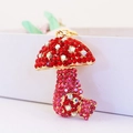 Colorful mushroom keychain pendant with red rhinestones and golden metal hardware - Red