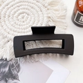 Close-up of matte black rectangular hair claw clip on aesthetic fringe coaster - Large Matte Square Claw-Black