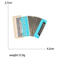 Blue and black enamel accordion brooch with 2.7cm height and 4.2cm width dimensions - Blue