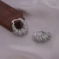 Silver twisted rope hoop earrings with industrial spring texture and secure clasp - E-069---Platinum