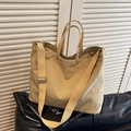 Minimalist large canvas tote bag in beige with adjustable strap for daily commute - Khaki