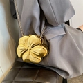 Elegant gold flower metal crossbody bag with mirror finish and slim chain strap - Gold