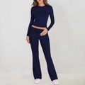 Dames set van marineblauw breisel met nauwsluitende top en uitlopende broek - S / Marineblauw