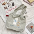 Detail of cute sheep embroidery and drawstring closure on light green canvas tote bag - Lamb Bear (Light Green)