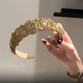 Cerchietto barocco vintage dorato con cristalli scintillanti e trama metallica - Oro