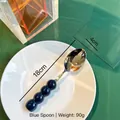 Cuillère inox avec manche en céramique bleue et design créatif perlé long 18cm - Cuillère / Bleu