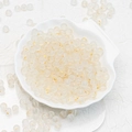 Translucent frosted DIY glass beads with gold foil flakes inside a shell tray - 8mm White with Gold Foil
