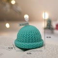 Green knitted hat scented candle with festive Christmas decor for holiday atmosphere - Dark Green Hat - Grapefruit Sea