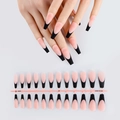 Macro view of matte nude pink coffin fake nails with classic black French tips - French Black Tip Long Almond Matte (XFS-MP15)