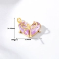 Detailansicht eines lila Herzanhängers mit Schleife und Perlen, Größe 24,03x22,4mm - 14K Vergoldet Rosa Herz Schleife