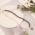 Black onyx and pearl necklace with colorful enamel turtle pendant on a white tray - Sea Turtle Agate Pearl Necklace (1#项链)